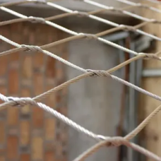 Сетка нержавеющая тросовая с параллельным узловым креплением и ромбической ячейкой Н6 7х7 AISI 304 25х43х1 мм